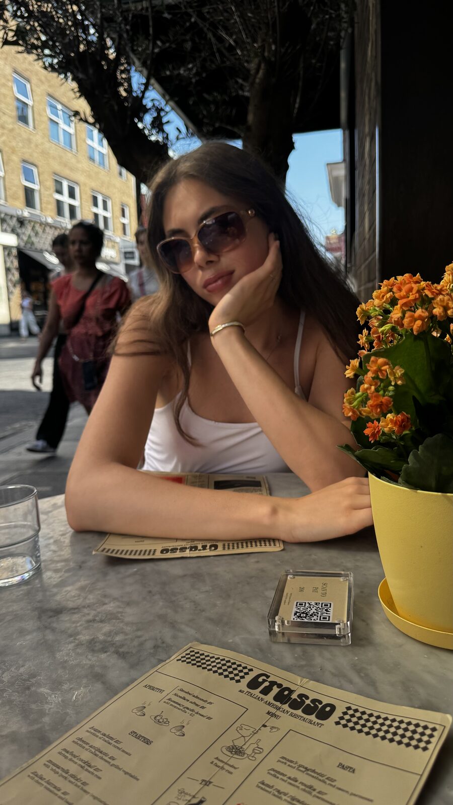 Liana smiling on camera